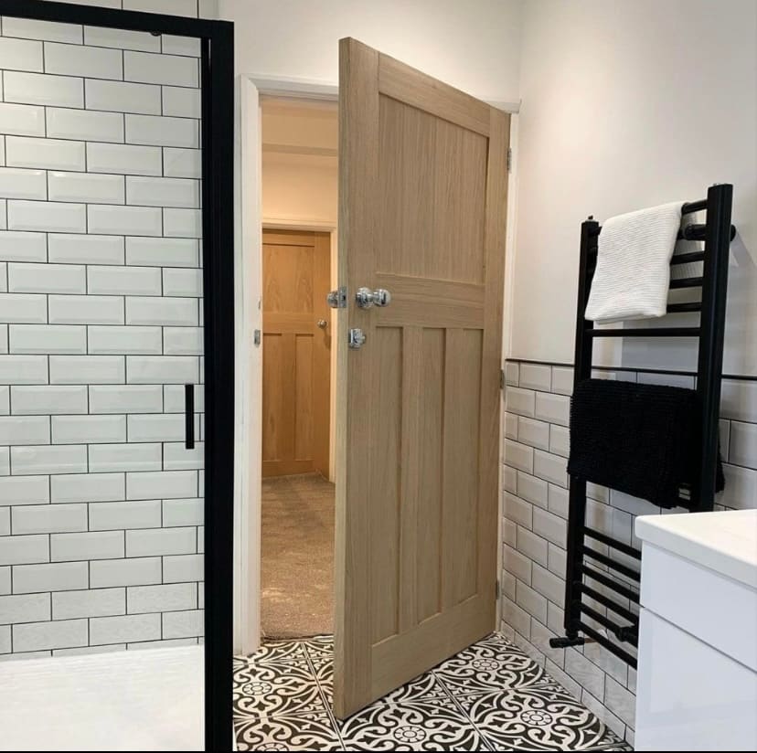 Oak bathroom door, Newcastle Oak panelled internal door fitted to a modern bathroom in Newcastle